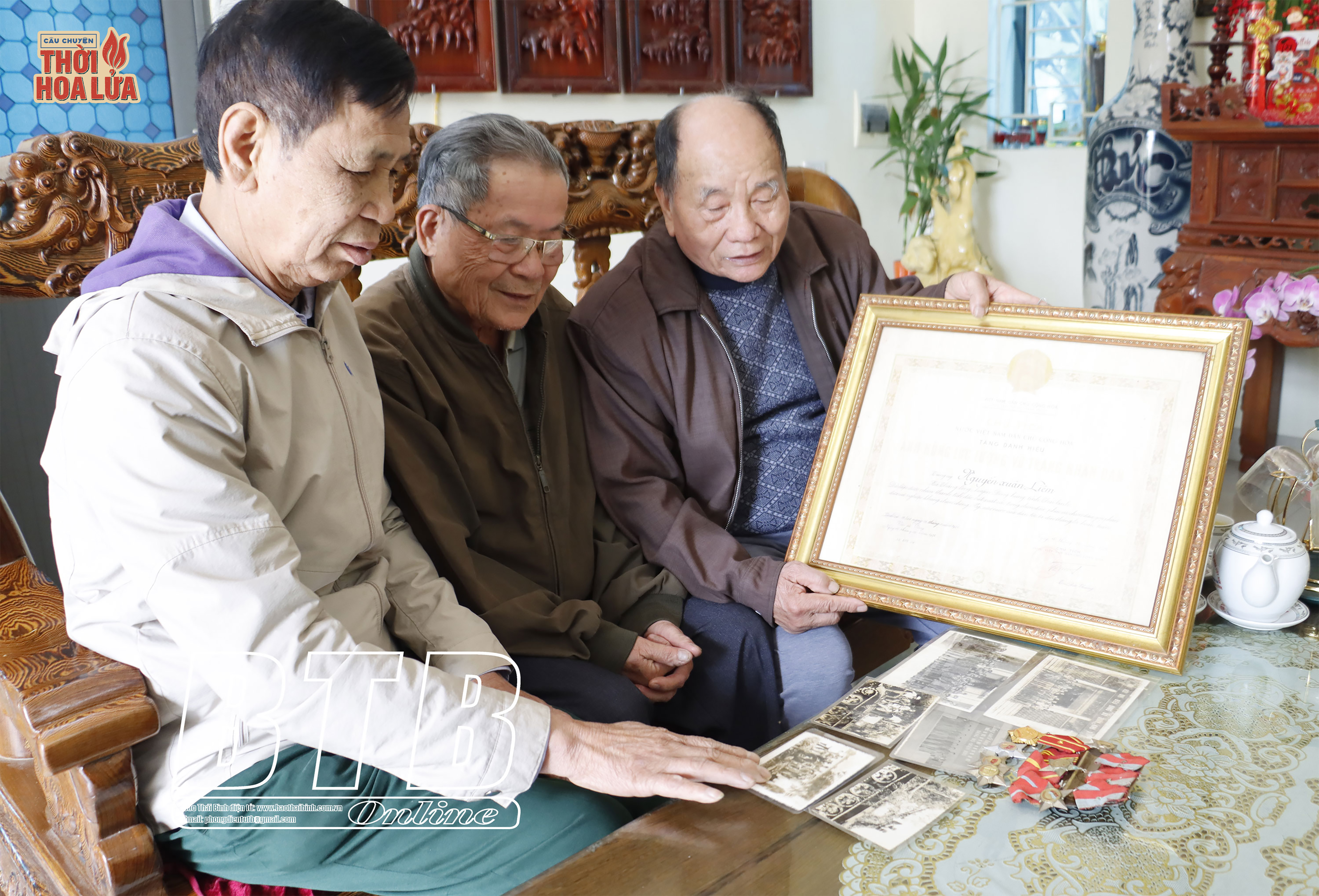 Anh hùng Lực lượng vũ trang nhân dân Nguyễn Xuân Liêm và cựu chiến binh Phạm Huỳnh